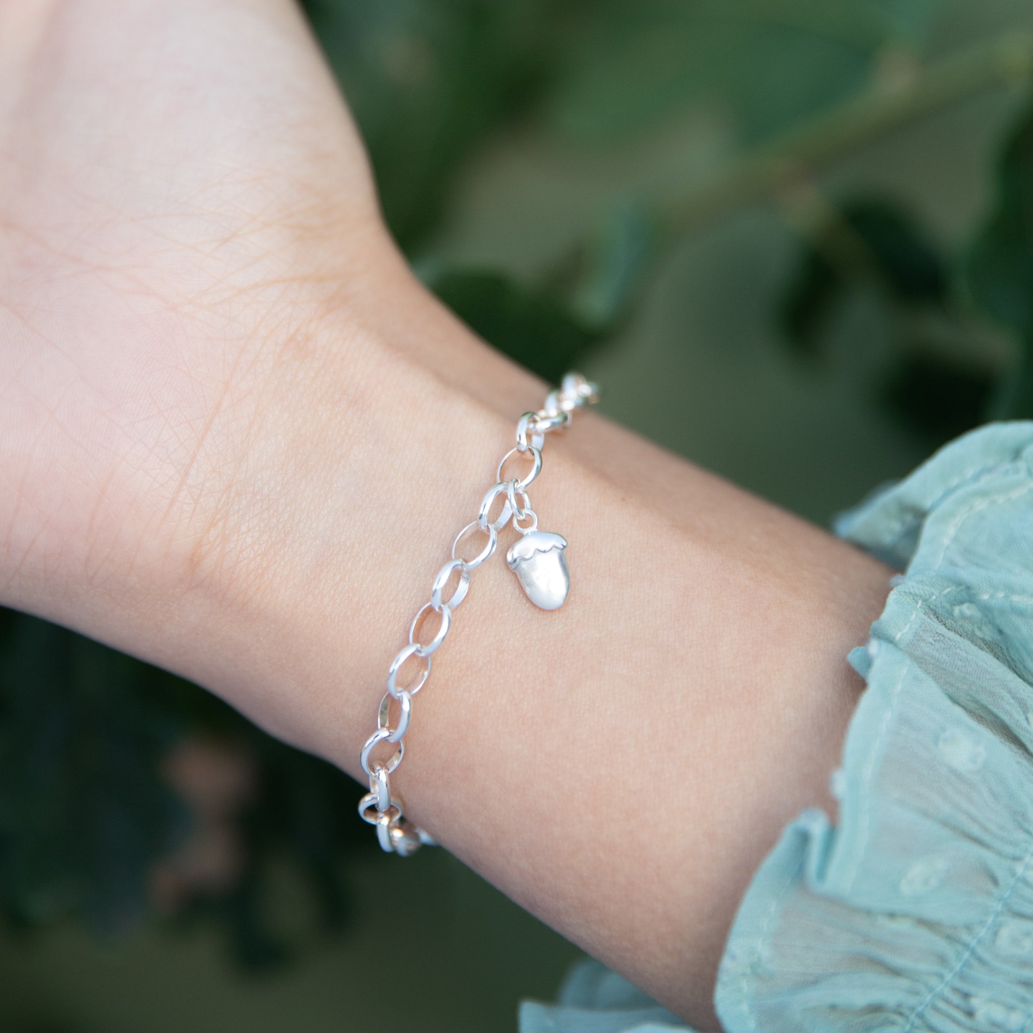 Silver acorn store bracelet